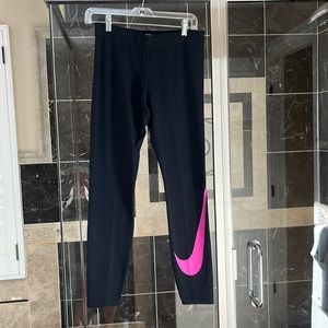 Nike black leggings, size M, NWOT. Never worn.
